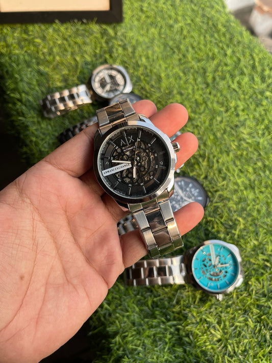 RC X Armanii Exxchange Automatic Skeleton Watch β Silver Chain with Black Dial