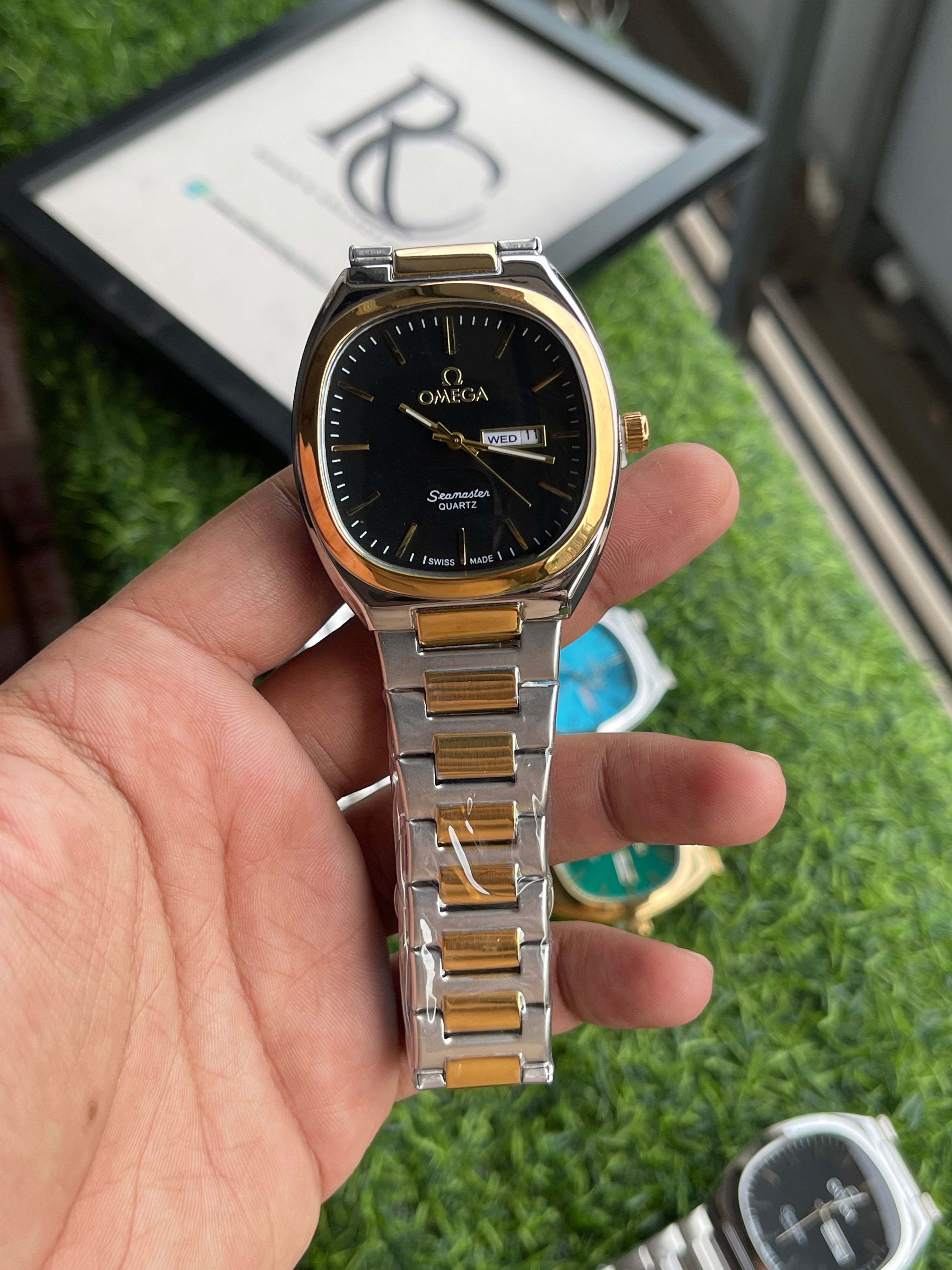 RC Omegaa Black Dial Two-Tone Quartz Watch (Gold & Silver Chain ...
