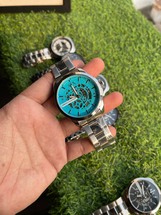 RC X Armanii Exxchange Automatic Skeleton Watch – Silver Chain with Turquoise Blue Dial